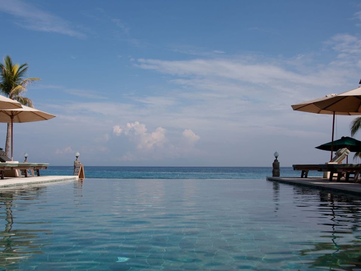 Resort infinity pool by the beach